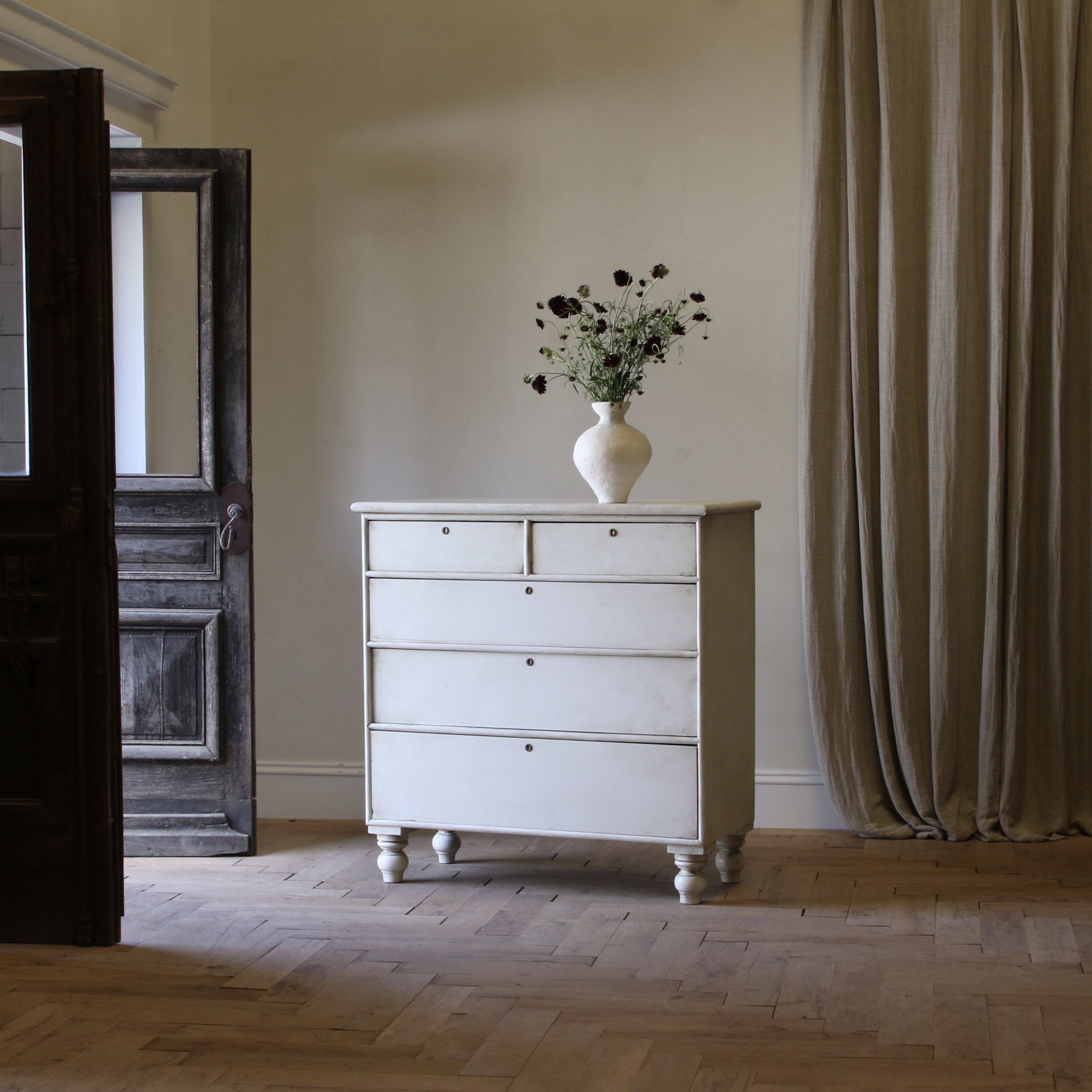 An English Painted Chest of Drawers